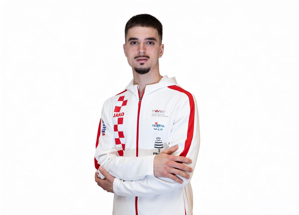 Headshot of Dino Prizmic